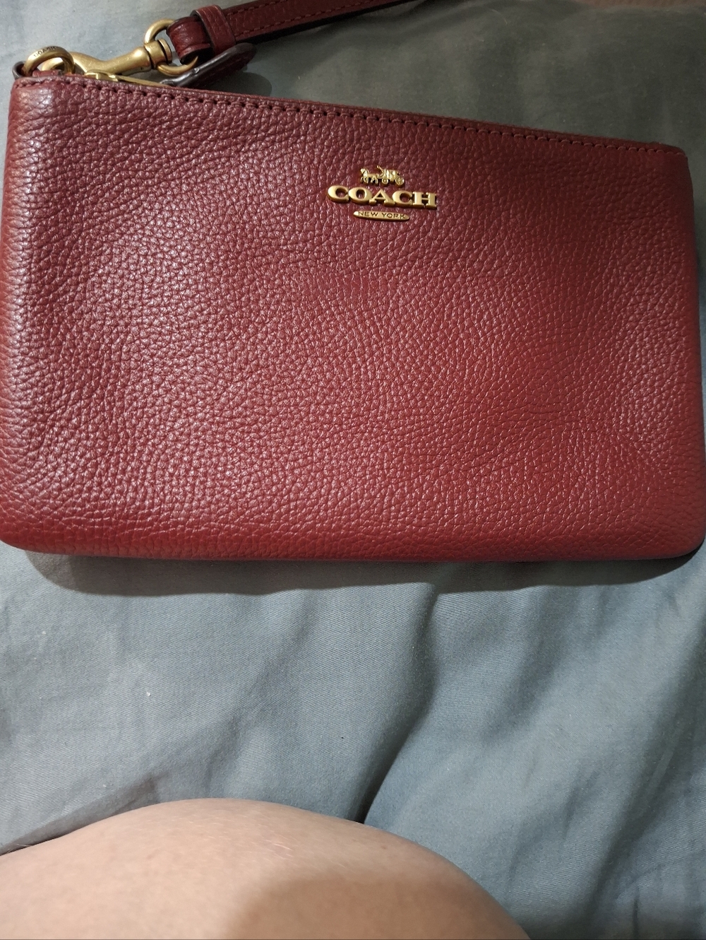 Coach Pebbled Leather Wristlet in Burgundy with Gold Hardware